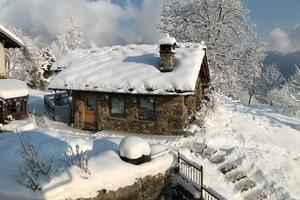 Baita con giardino recintato