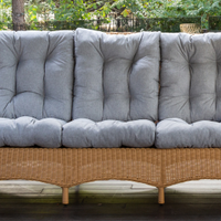 Divano per terrazzo. In rattan beige.