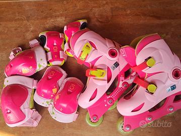 Pattini a rotelle e protezioni bambina