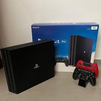 PS4 Pro + 3 joystick + Stand di ricarica + 1 gioco