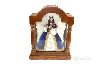 Teca con Madonna