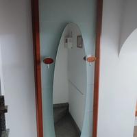 Attaccapanni divisorio con specchio. 