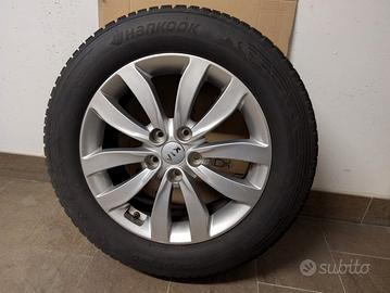 Pneumatici invernali completi di cerchio