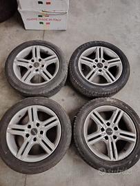 4 cerchi in lega con gomme  205 55 16 bmw
