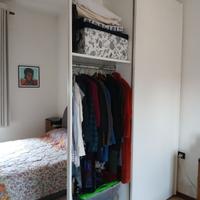 Armadio, letto matrimoniale e comodini