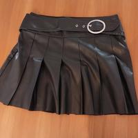 Gonna pelle con pieghe