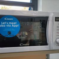 Forno microonde nuovo Candy bianco