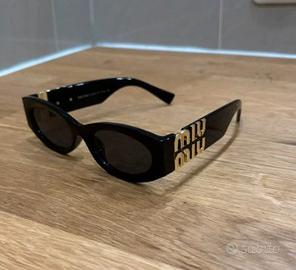 Miu Miu Occhiali con scatola