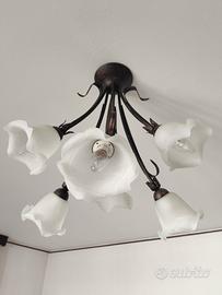 Lampadario in acciaio e vetro
