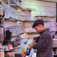Barista con barman
