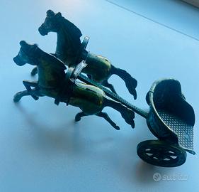 horse with heavy metal cart