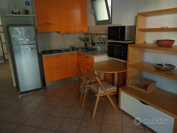 Riccione, bilocale con giardono