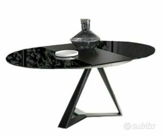 Tavolo rotondo allungabile in cristallo ed acciaio