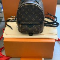 zaino e portafoglio Louis Vuitton