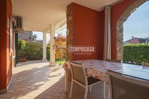 BILOCALE CON GIARDINO IN RESIDENCE CON PISCINA