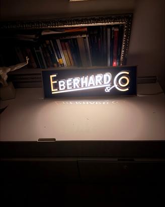 Insegna luminosa  eberhard vintage