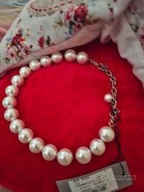 Collier con cartellino