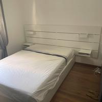 Letto contenitore una piazza e mezzo con testata