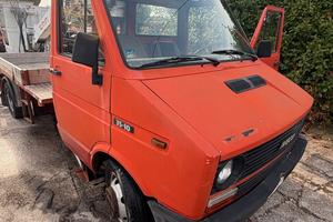 M144 - IVECO DAILY CON PIATTAFORMA CESTA AEREA