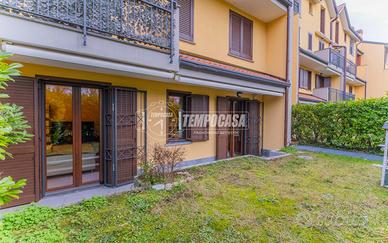 BILOCALE CON GIARDINO PRIVATO E BOX