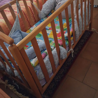 Lettino a sbarre in legno massiccio