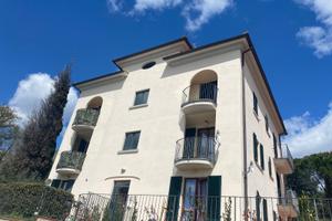 Appartamento con giardino e garage