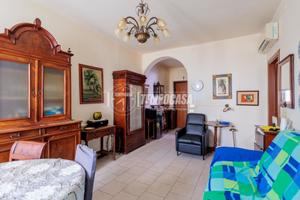 Quadrilocale con garage e cantina da ristrutturare