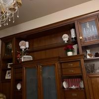 Parete attrezzata in legno porta TV con divani