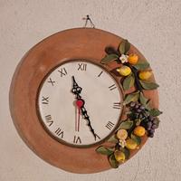 orologio a parete in terracotta