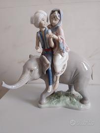 Lladro bambini indù su elefante