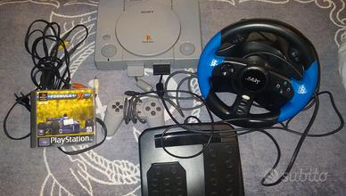ps1 con volante,pedaliera e gioco
