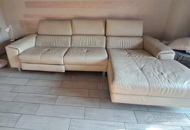 Divano in pelle con penisola e sedile relax