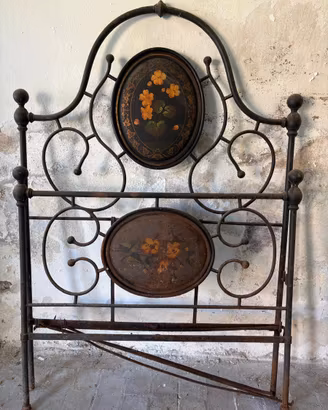 Letto antico in ferro battuto
