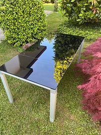 tavolo prolungabile con piano in vetro