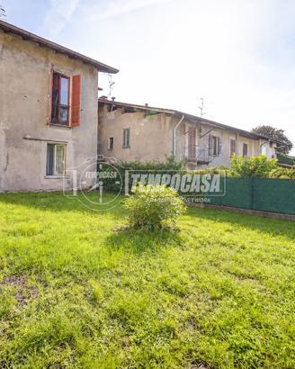 CARONNO VARESINO - PORZIONE DI CASA CON GIARDINO E