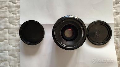 Nikon AF Nikkor 35mm f/2+ Accessori