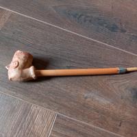 Pipa terracotta con testa d’uomo