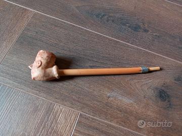 Pipa terracotta con testa d’uomo