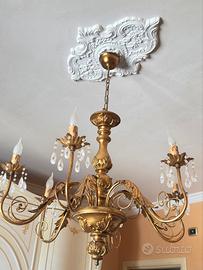 Lampadario e tris camera da letto