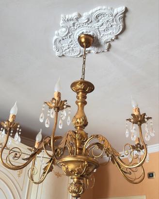 Lampadario e tris camera da letto