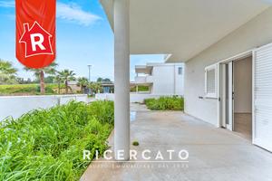 Piano terra bifamiliare con giardino