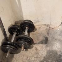 Manubri con pesi e bilancere