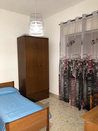 Camere singole arredate per studentesse
