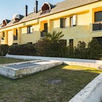 Appartamento con giardino privato e box auto