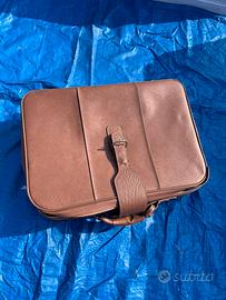Valigia marrone vintage con ruote, vera anni 70.