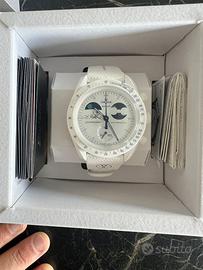 Omega Swatch Mission to Earthphase Moonshine gold