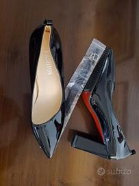 Scarpe uomo 47 con tacco