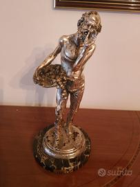 statua