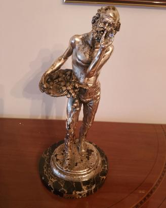 statua