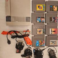 Nintendo Nes anni 90 con cavi, controller e giochi